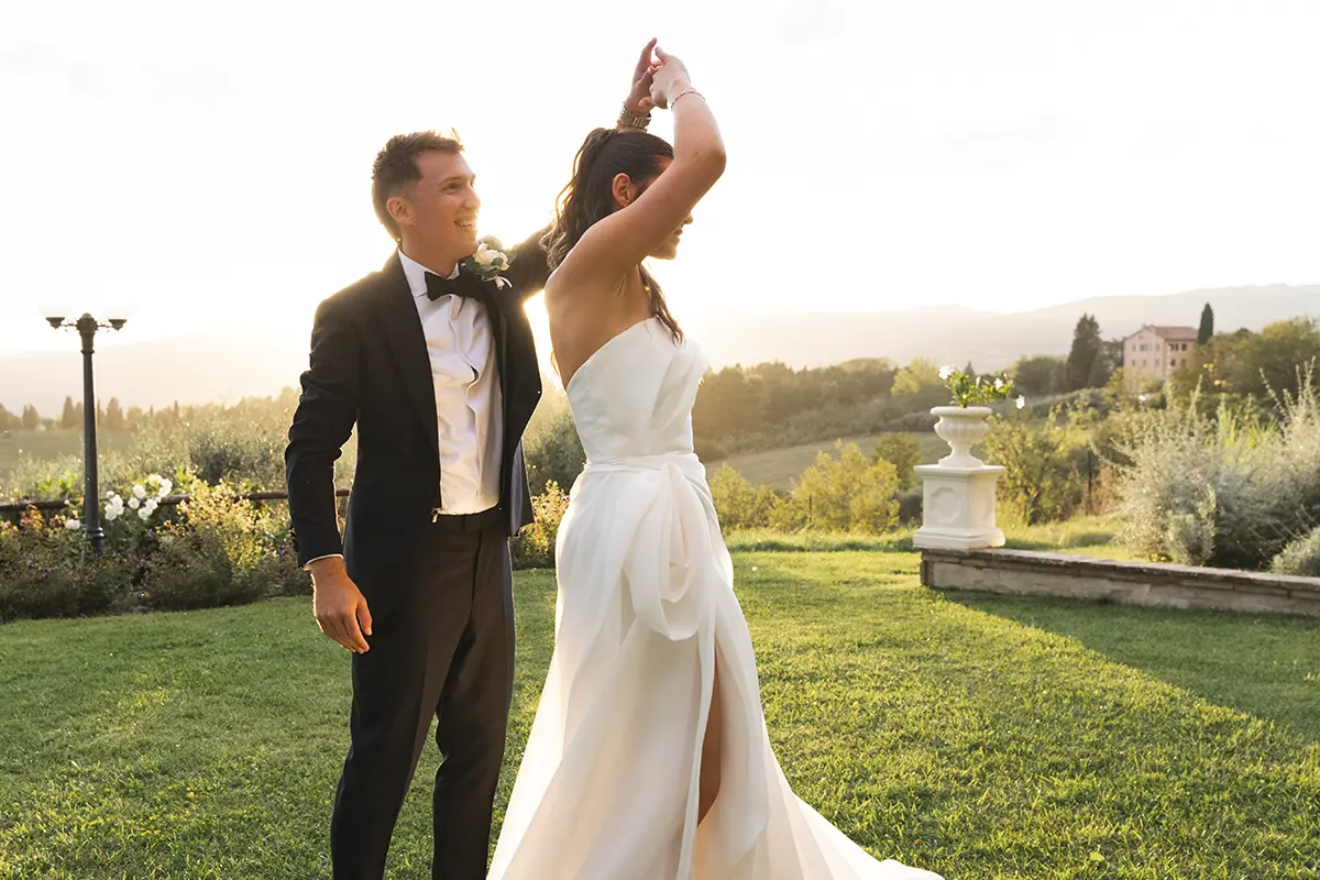 Newlyweds dance at sunset