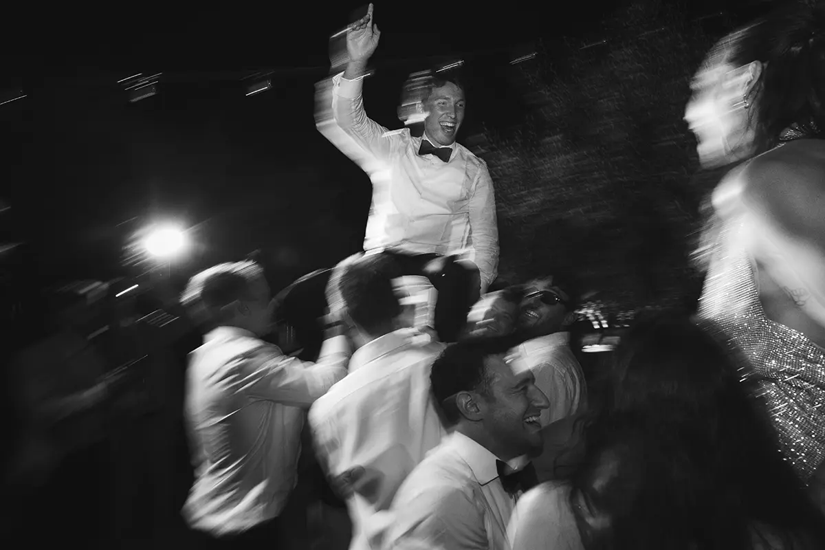 groom dances with the bride