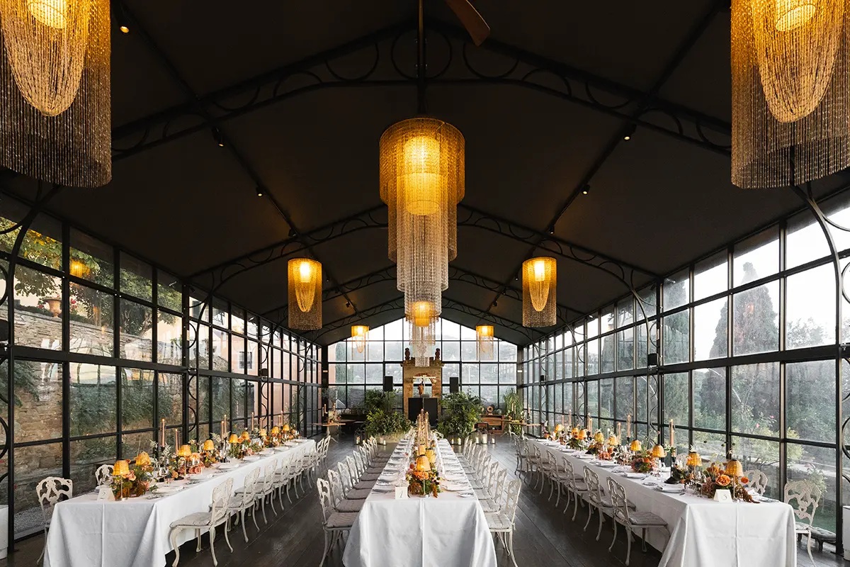 Floral arrangements for a wedding at the Relais il Falconiere in Cortona inside a lemon grove.