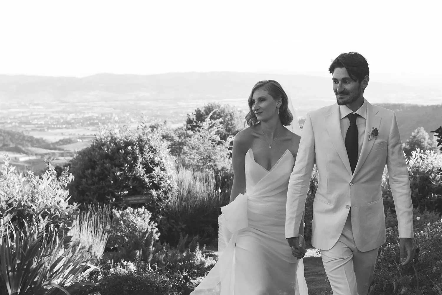 Newlyweds holding hands