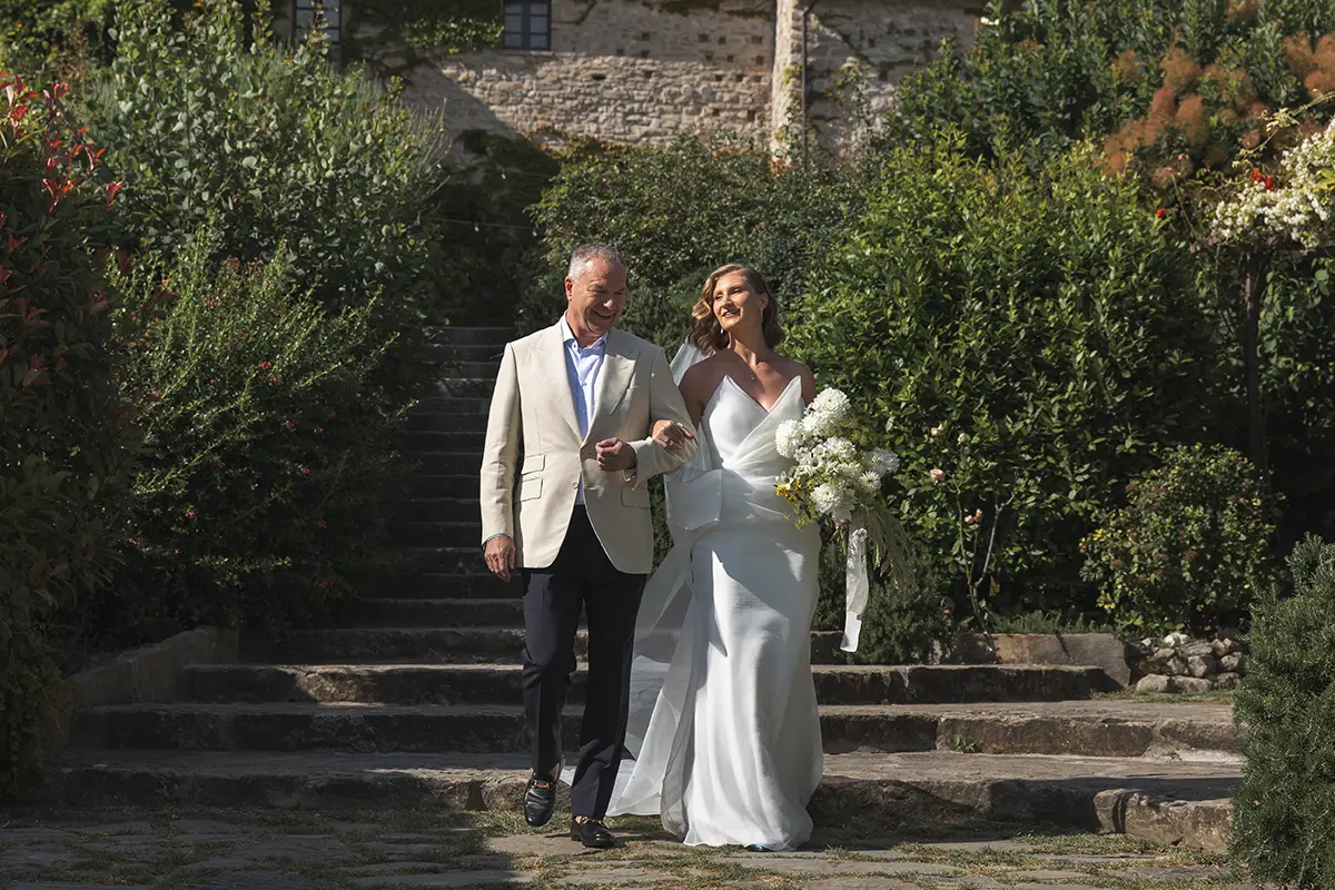 The bride, accompanied by her father