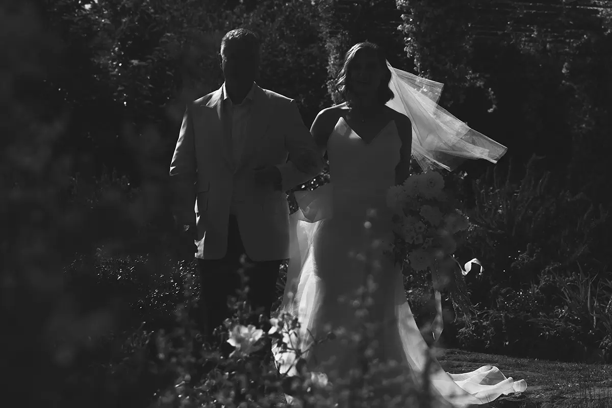 The bride and her father go to the ceremony