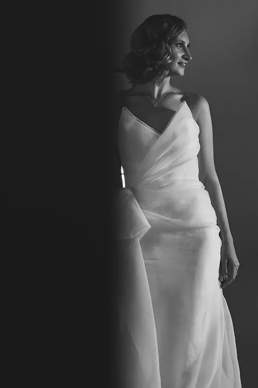 Bride smiles in her dress
