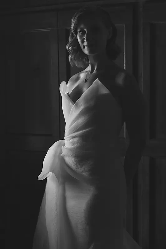 Bride smiles in her dress
